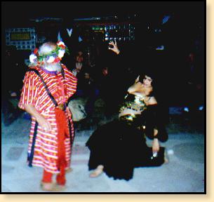 Zorthian dancing with belly-dancer at Primavera.